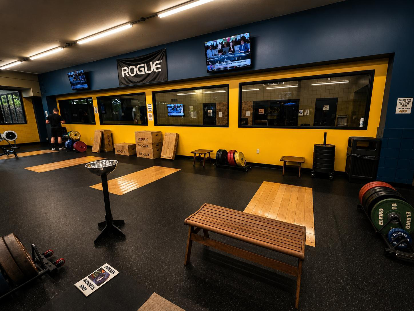 In-ground deadlift platform with heavy duty flooring for powerlifting at Cleveland Fitness Club