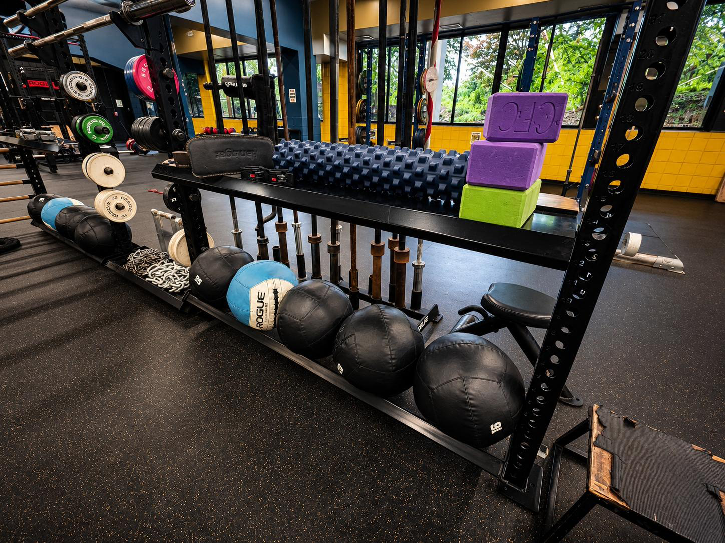 Weightlifting accessories and supporting equipment at Cleveland Fitness Club Olympic lifting area